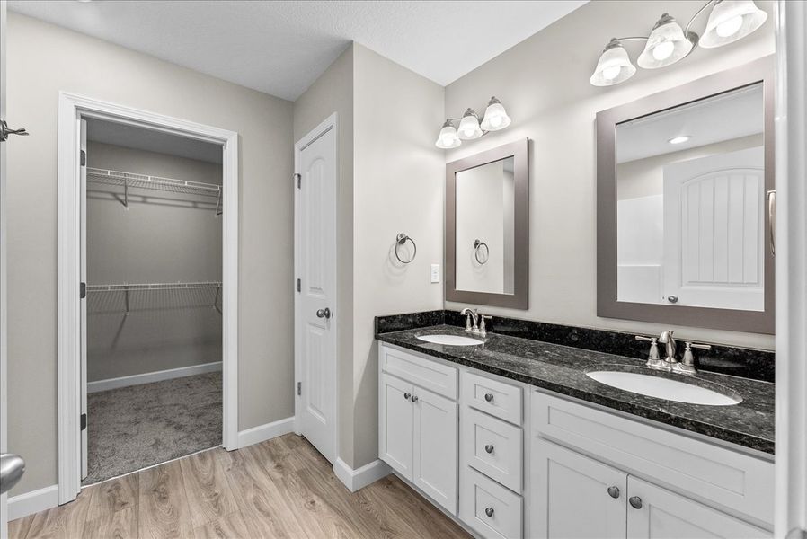 Representative furnished interior of a home built from the Sumter by Enchanted Homes in Lonesome Dove, San Antonio (Image 11).