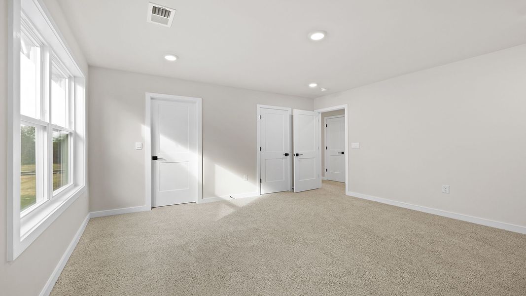 Representative unfurnished interior of a home built from the BERKSHIRE by D.R. Horton in Sycamore Cove, Woodruff (Image 22).