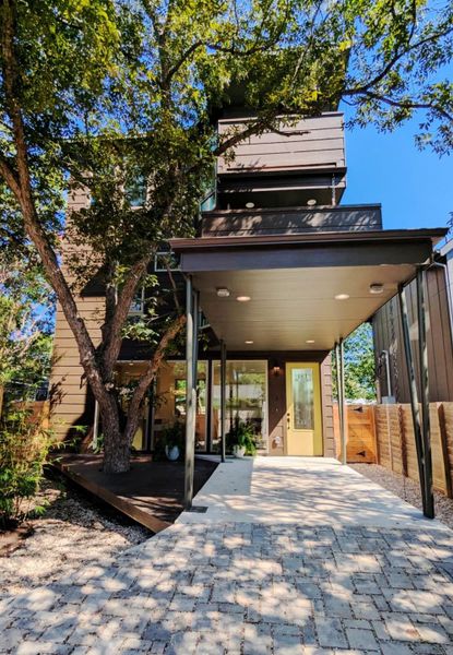 Front exterior of a new home in , Austin, TX, highlighting curb appeal (Image 21). Front exterior of a new home in , Austin, TX, highlighting curb appeal (Image 21).