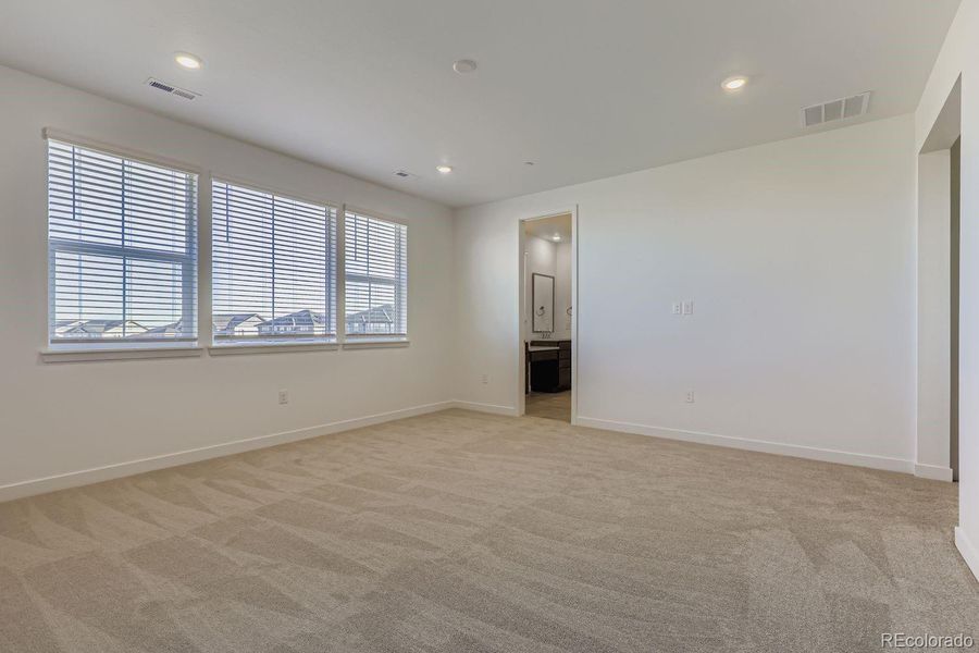 Spacious, unfurnished interior of a new home in Sunset Village: The Grand Collection, Erie (Image 9).