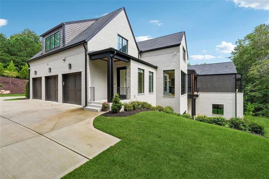 Front exterior of a new home in , Roswell, GA, highlighting curb appeal (Image 20).