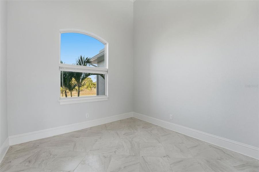 Spacious, unfurnished interior of a new home in , Port Charlotte (Image 21).