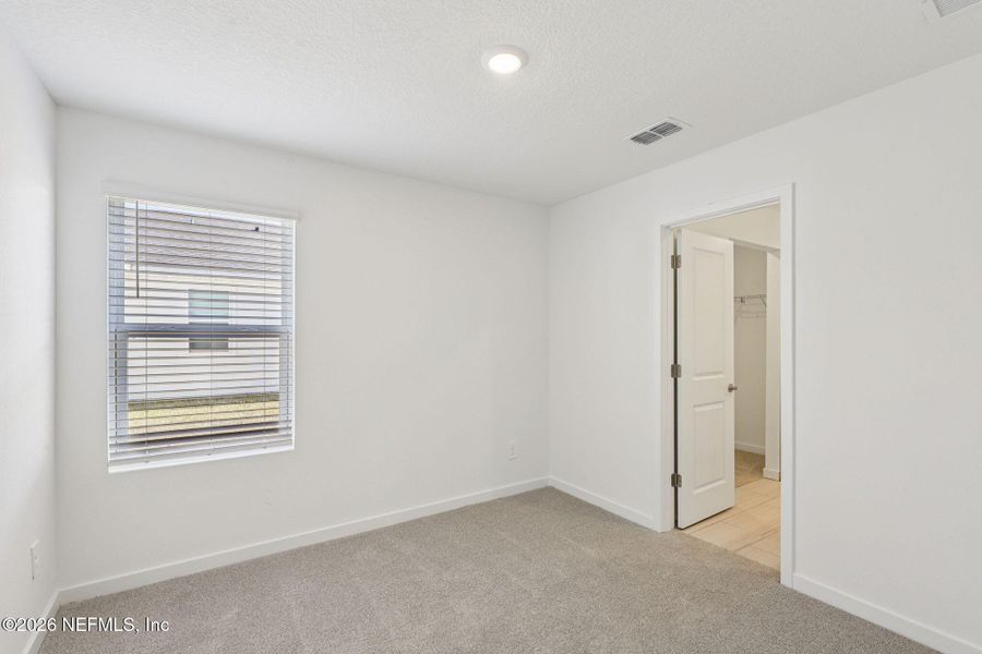 Spacious, unfurnished interior of a new home in Colbert Landings, Palm Coast (Image 21).