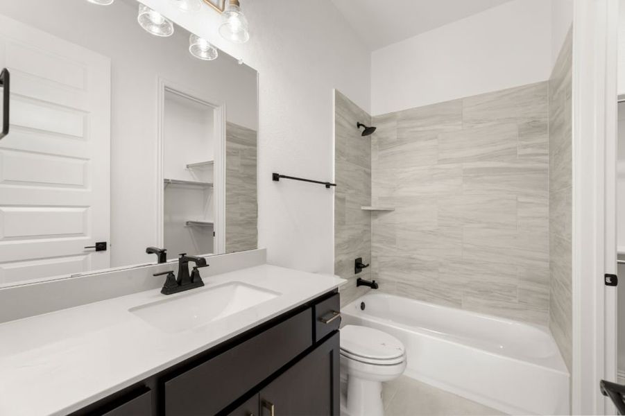 Representative furnished interior of a home built from the The Whitney by UnionMain Homes in Cambridge Crossing, Celina (Image 7).