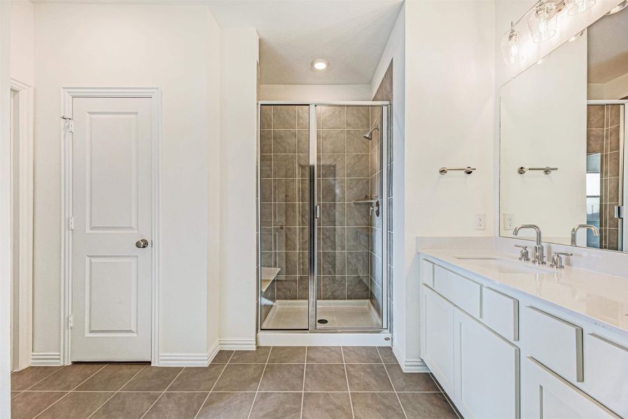 Brown Townhome Primary Bathroom by Ashton Woods