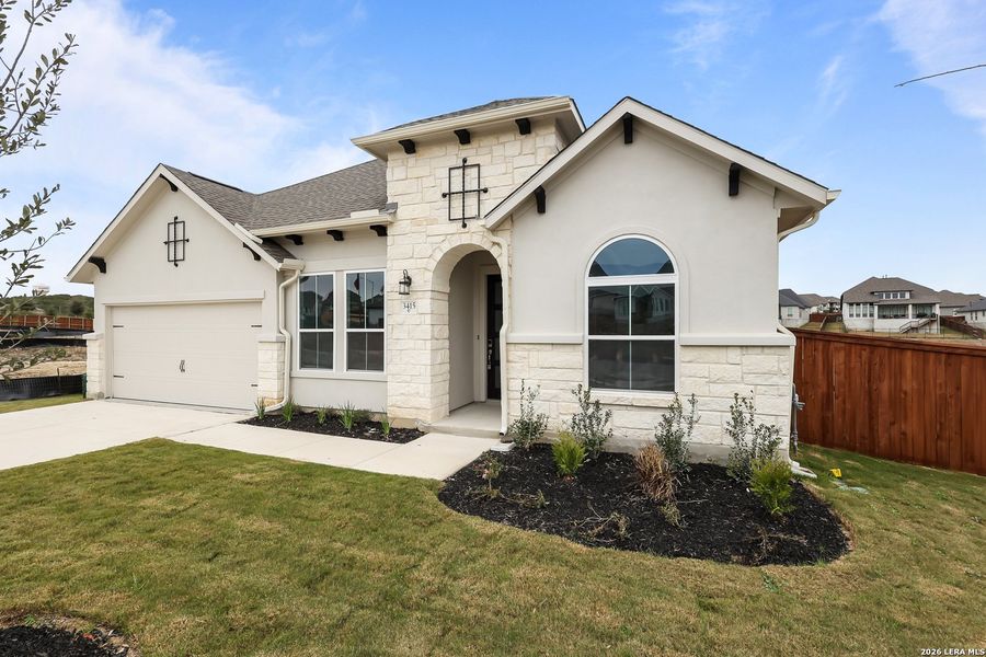 Front exterior of a new home in Homestead, Schertz, TX, highlighting curb appeal (Image 23).