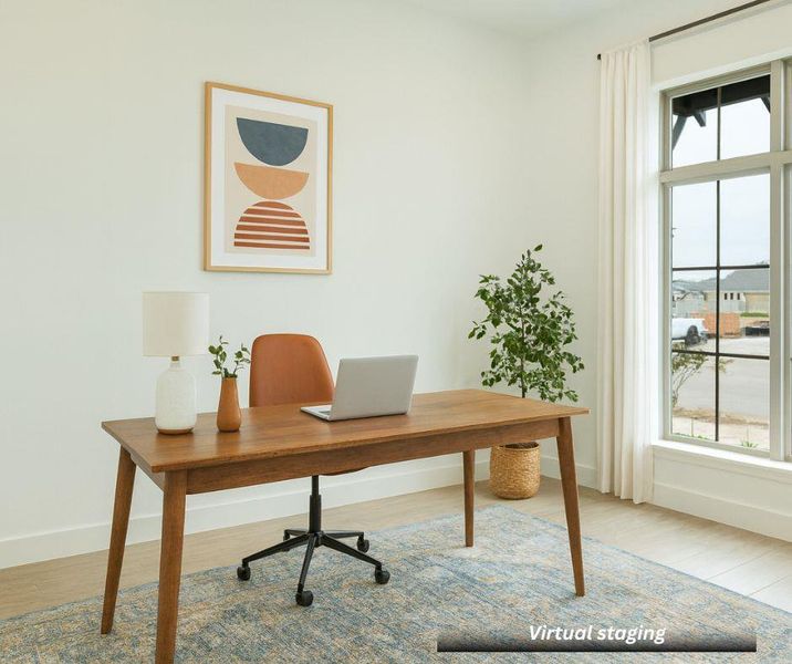 Virtually staged dedicated office on them main level facing the front of the house. Room has a cathedral ceiling. Virtually staged dedicated office on them main level facing the front of the house. Room has a cathedral ceiling.