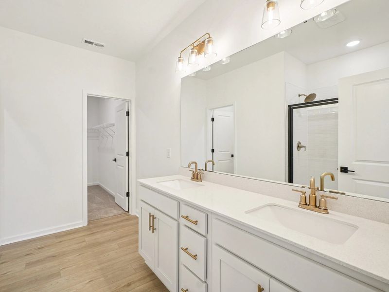 Primary Bath featuring the AW Collection® Serene - Clean forms offer quiet luxury.