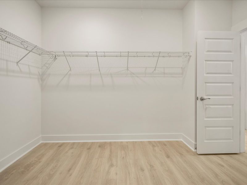 Spacious, unfurnished interior of a new home in The Coves at Lakes of Cane Bay, Summerville (Image 18).