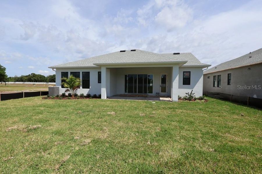 Exterior details and patio area of a home in Lakeview Crossing – Classic Series, Sarasota (Image 3).