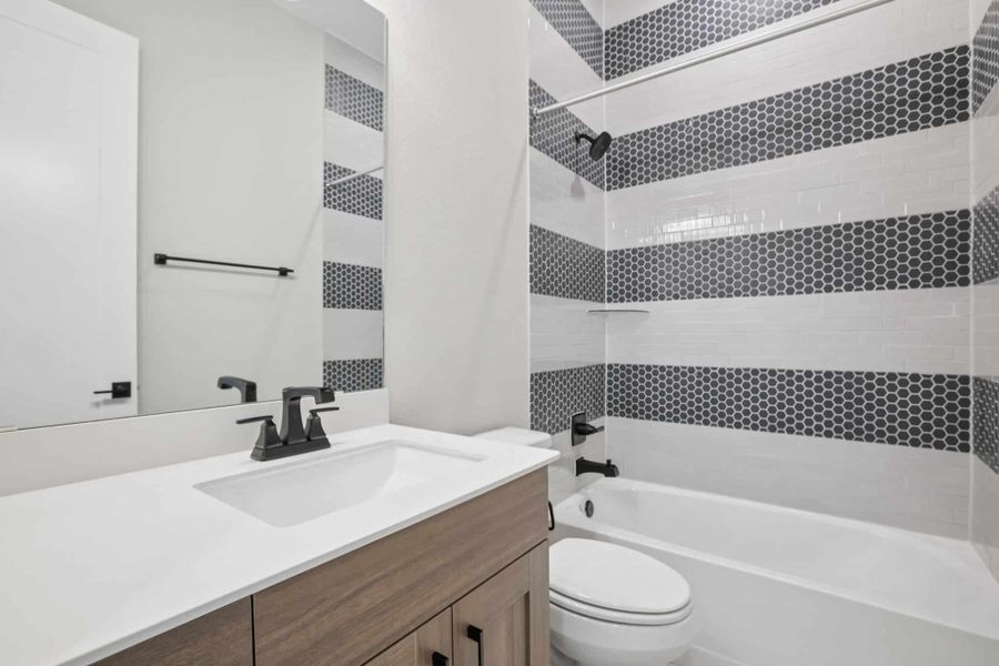 Furnished interior view inside a new home in 6 Creeks, Kyle (Image 17).