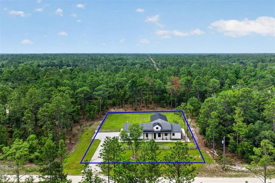 Front exterior of a new home in , Dunnellon, FL, highlighting curb appeal (Image 23).