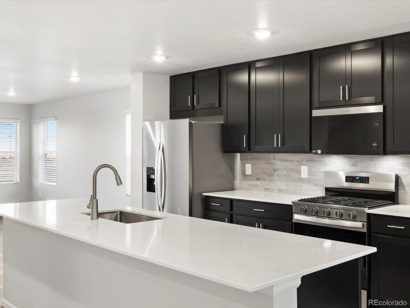 Furnished interior view inside a new home in Three Hills, Morrison (Image 4).