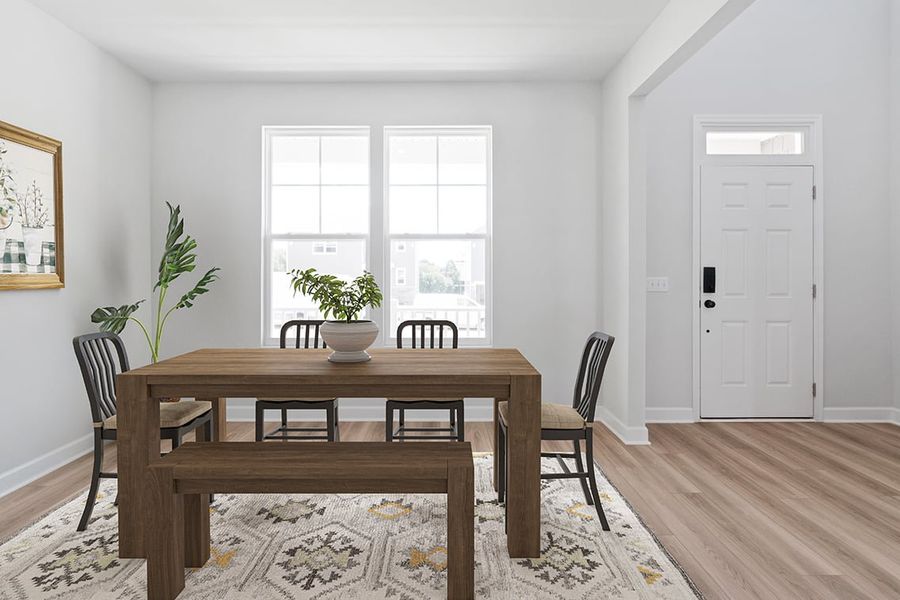 A dining room table with chairs and a plant on it. A dining room table with chairs and a plant on it.