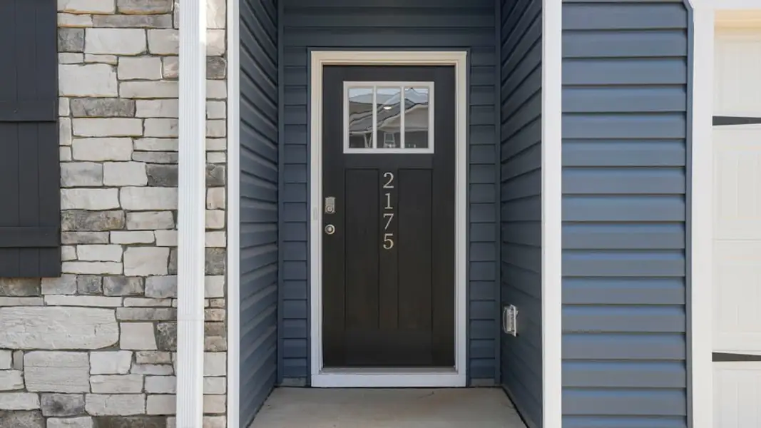 Exterior details and patio area of a home in Benjamin's Grove, Woodruff (Image 3).