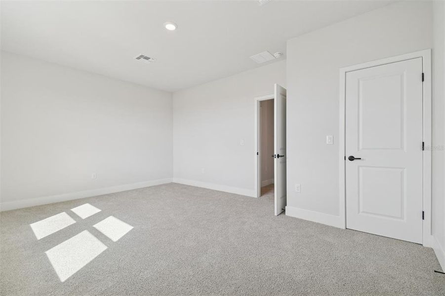 Spacious, unfurnished interior of a new home in Waterset Tradition Series, Apollo Beach (Image 35).