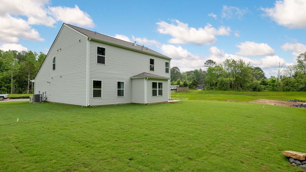 Front exterior of a new home in Price's Crossing, LaFayette, GA, highlighting curb appeal (Image 27).