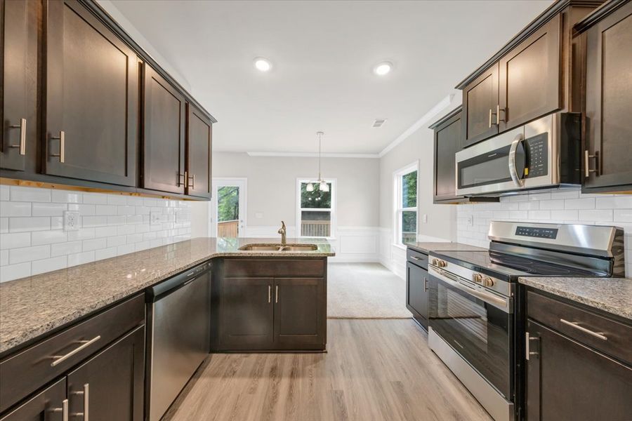 Furnished interior view inside a new home in Scarlett Place, Bowdon (Image 6).