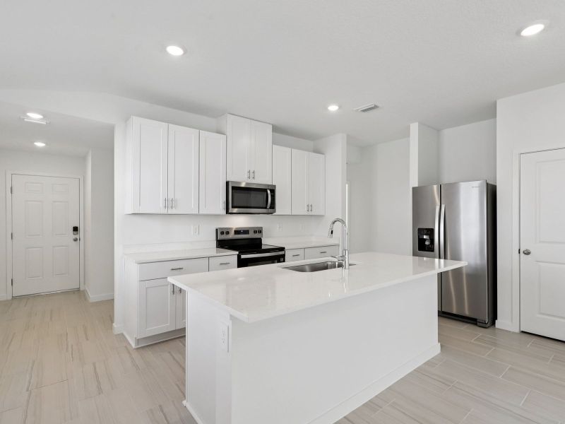 Furnished interior view inside a new home in Flagler Village - Classic Series, Palm Coast (Image 5).