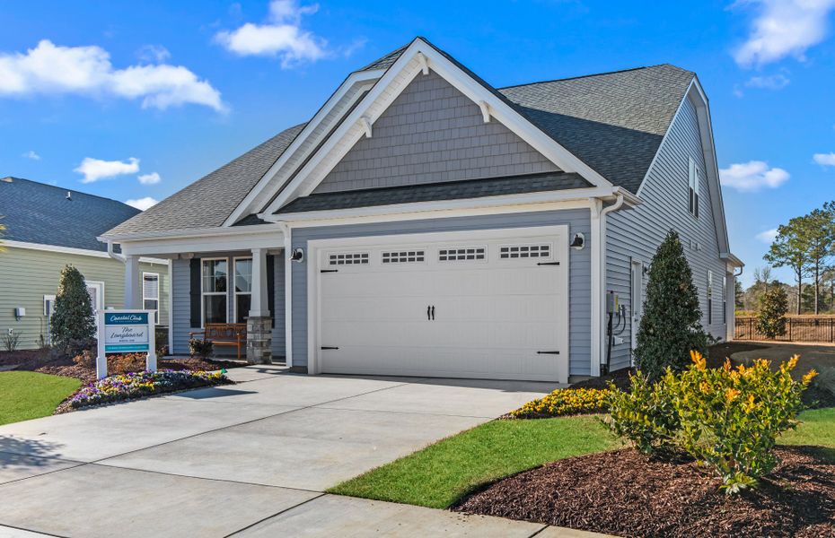 Representative exterior photo of a completed home built from the The Longboard by Chesapeake Homes in Terrapin, Leland, NC (Image 28). Representative exterior photo of a completed home built from the The Longboard by Chesapeake Homes in Terrapin, Leland, NC (Image 28).