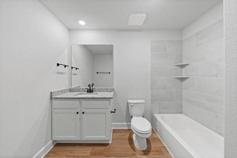 Furnished interior view inside a new home in Whisper Valley, Manor (Image 9).