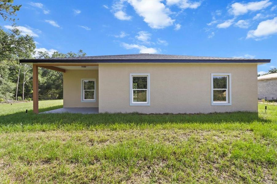 Exterior details and patio area of a home in , Citrus Springs (Image 22).