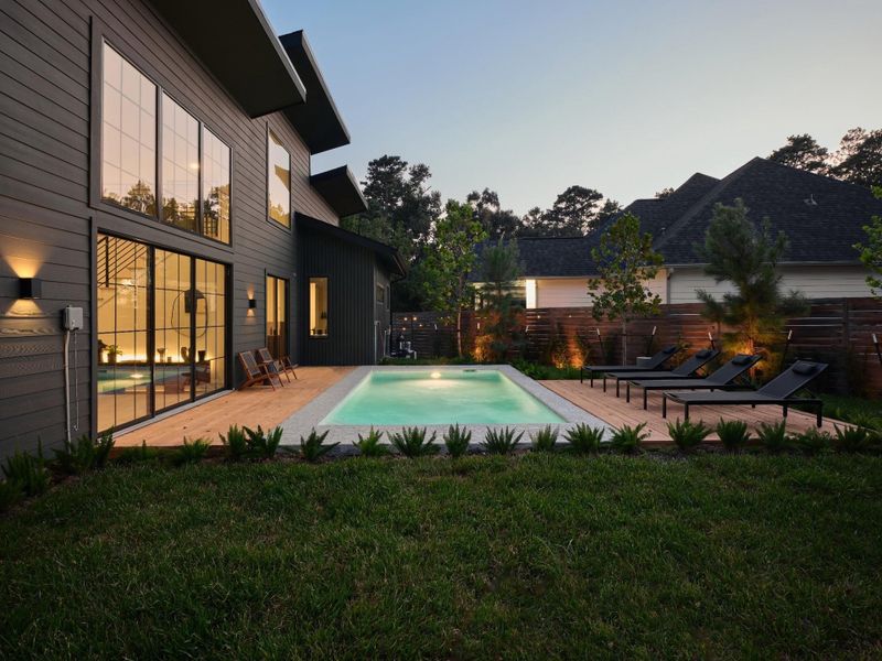 Exterior details and patio area of a home in , Conroe (Image 26).
