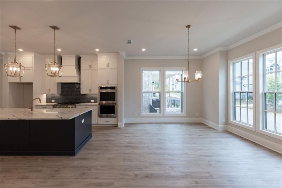 Furnished interior view inside a new home in Brackley Single Family, Cumming (Image 7).
