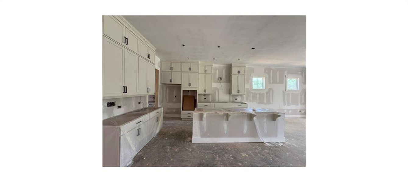 In-progress construction of a new home in Silverwood, Cumming, GA (Image 39).