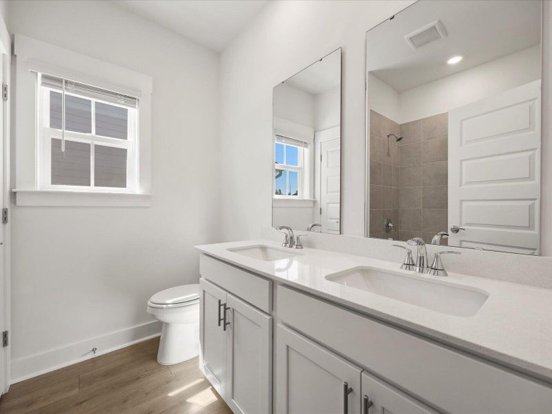 Furnished interior view inside a new home in The Coves at Lakes of Cane Bay, Summerville (Image 13). Furnished interior view inside a new home in The Coves at Lakes of Cane Bay, Summerville (Image 13).