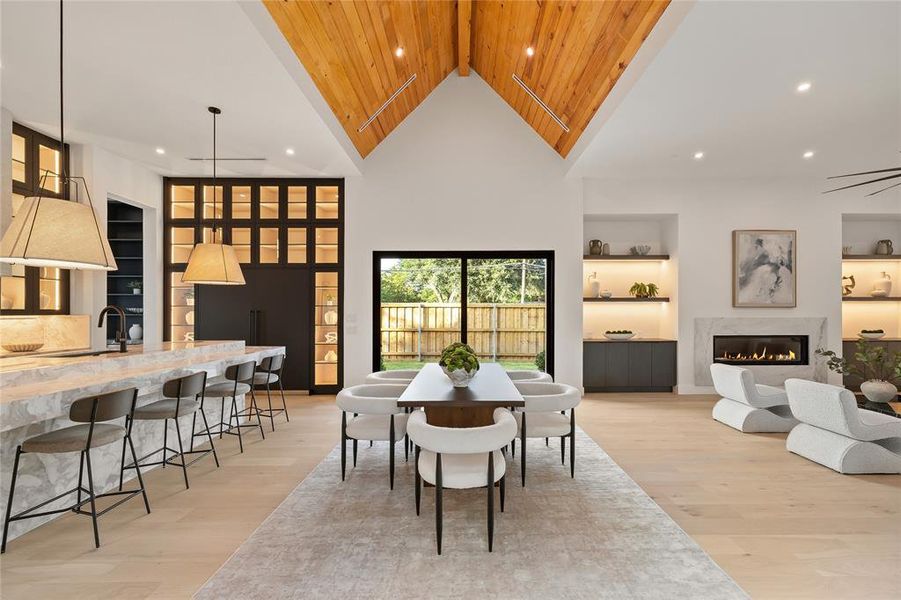 Vaulted wood-paneled ceiling highlights this open-concept living space Vaulted wood-paneled ceiling highlights this open-concept living space