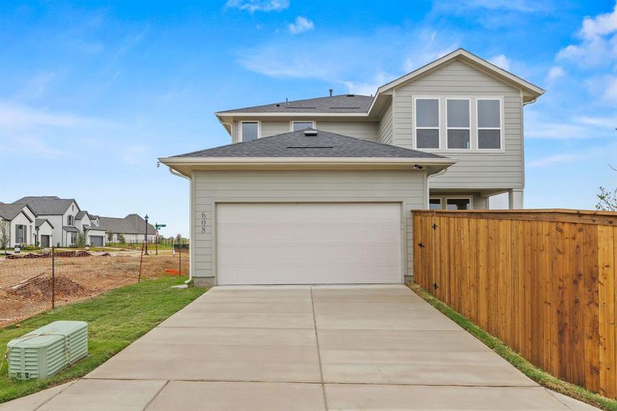 Exterior details and patio area of a home in The Heights at Uptown Celina, Celina (Image 3). Exterior details and patio area of a home in The Heights at Uptown Celina, Celina (Image 3).