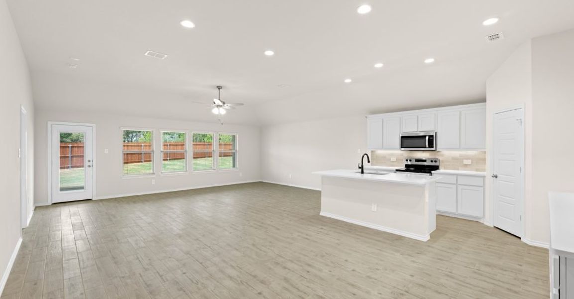 Representative exterior photo of a completed home built from the Austin by Impression Homes in Keeneland, Aubrey, TX (Image 6).