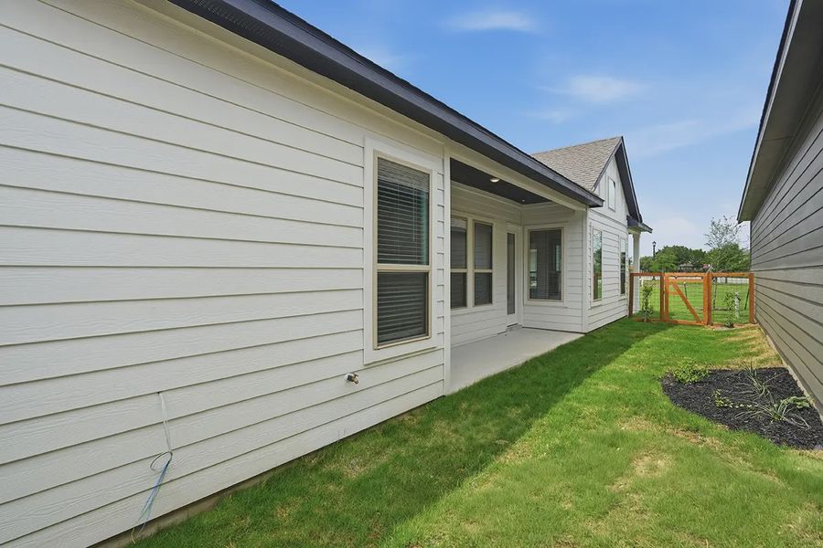 Exterior details and patio area of a home in The Crossvine, Schertz (Image 26).