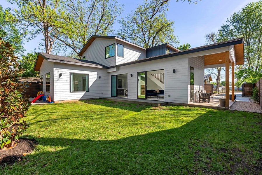 Plenty of room for pool! Side entry front porch and 2 car garage behind gate at the rear of the lot.