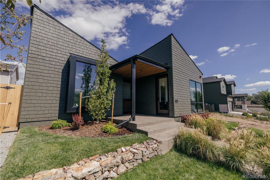 Front exterior of a new home in , Superior, CO, highlighting curb appeal (Image 22).