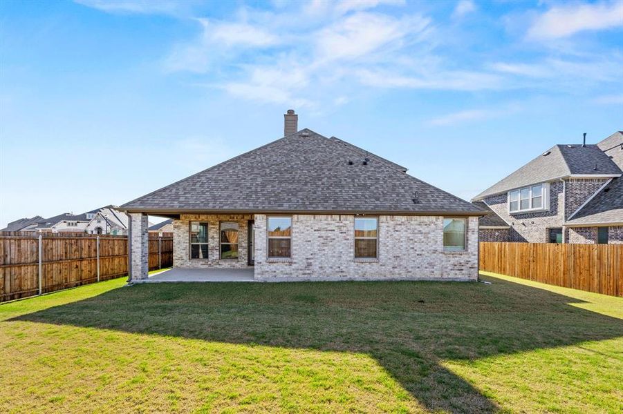 Exterior details and patio area of a home in Stone River Glen, Royse City (Image 25). Exterior details and patio area of a home in Stone River Glen, Royse City (Image 25).