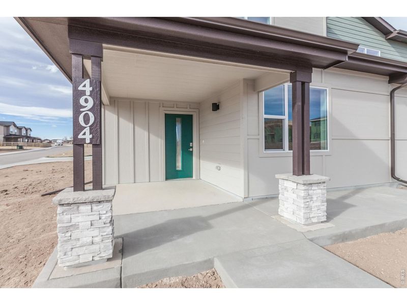 Exterior details and patio area of a home in , Timnath (Image 26).