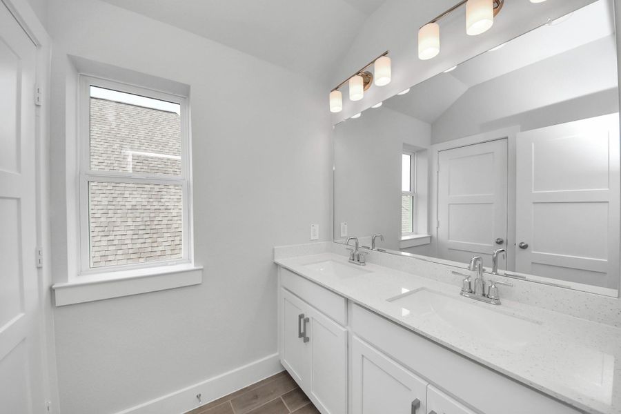 Furnished interior view inside a new home in Amira: Premier Collection, Tomball (Image 6).