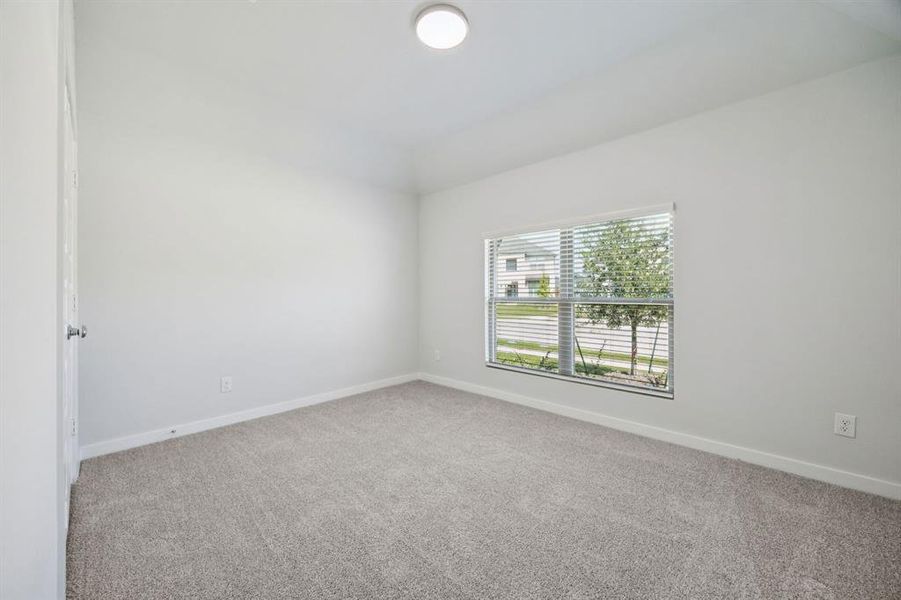 Bedroom in the Heisman home plan by Trophy Signature Homes – REPRESENTATIVE PHOTO Bedroom in the Heisman home plan by Trophy Signature Homes – REPRESENTATIVE PHOTO