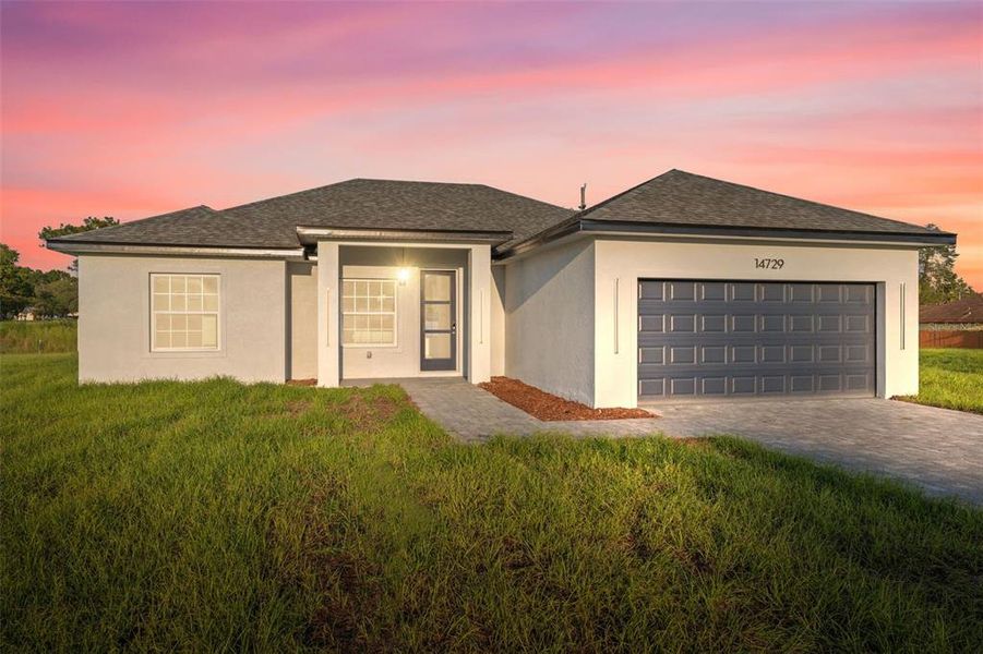 Front exterior of a new home in , Ocala, FL, highlighting curb appeal (Image 2). Front exterior of a new home in , Ocala, FL, highlighting curb appeal (Image 2).