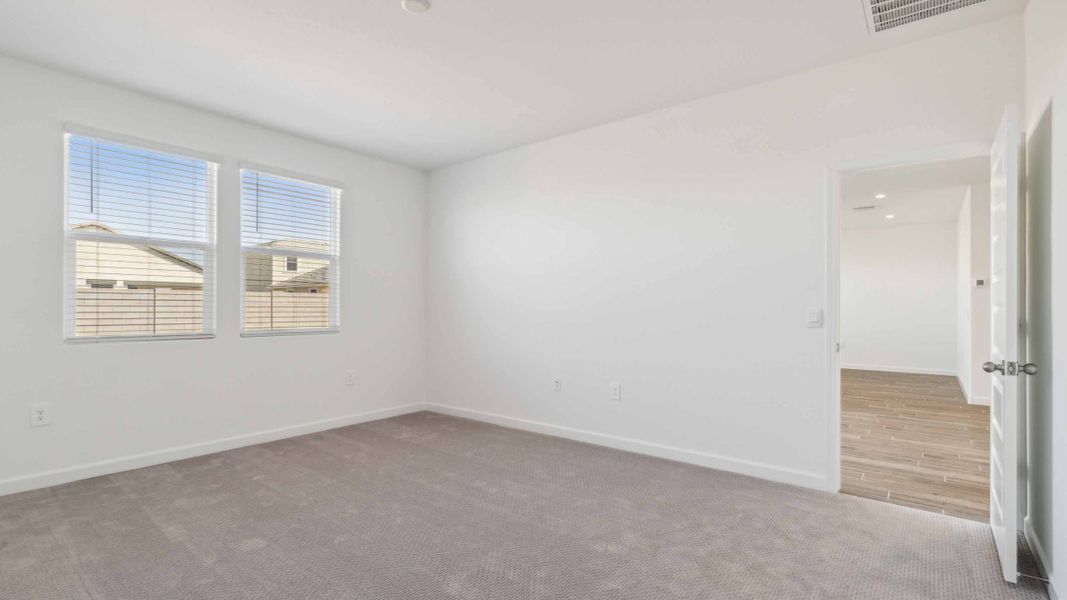 Spacious, unfurnished interior of a new home in Radiance at Superstition Vistas, Apache Junction (Image 19).