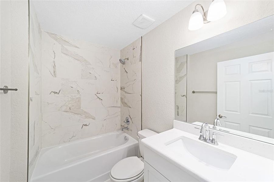 Furnished interior view inside a new home in , Dunnellon (Image 8).