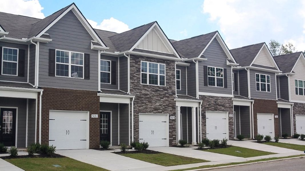 Front exterior of a new home in King's Landing, Lewisburg, TN, highlighting curb appeal (Image 1).
