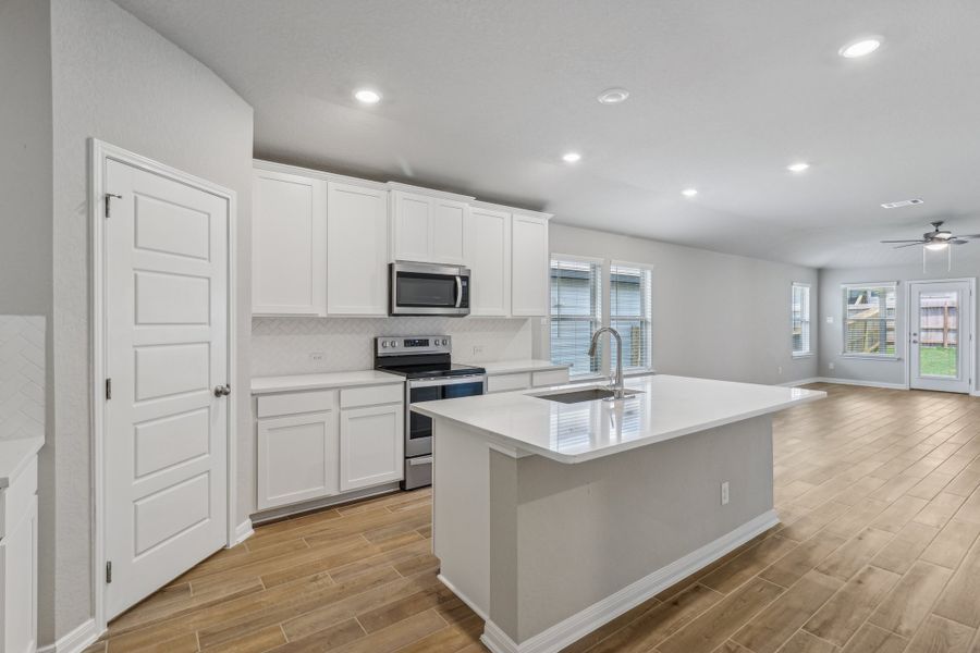 Kitchen in the Allen floorplan at a Meritage Homes community. Kitchen in the Allen floorplan at a Meritage Homes community.