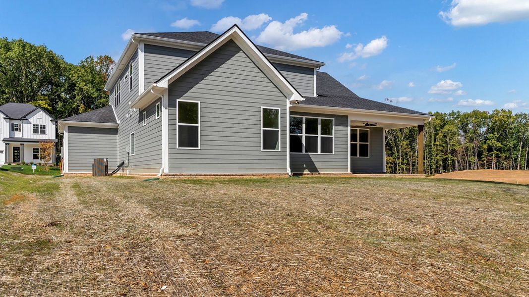 Exterior details and patio area of a home in Brush Creek, Fairview (Image 24).