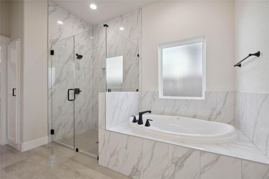 Bathroom with independent shower and bath