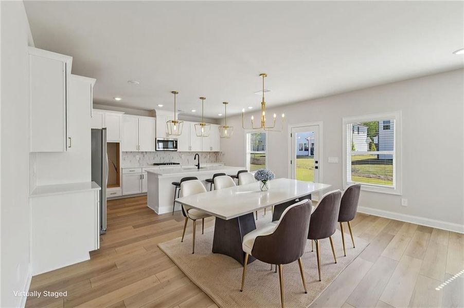 Furnished interior view inside a new home in Vines at Mill Creek - Estate Series, Braselton (Image 19).