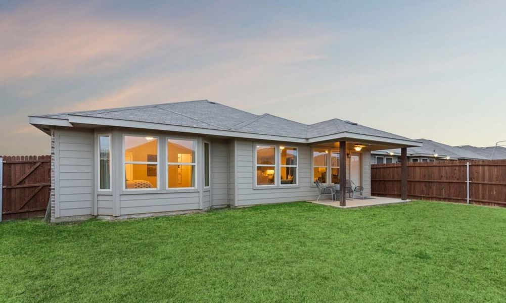 Front exterior of a new home in Rainbow Ridge, Fort Worth, TX, highlighting curb appeal (Image 23). Front exterior of a new home in Rainbow Ridge, Fort Worth, TX, highlighting curb appeal (Image 23).