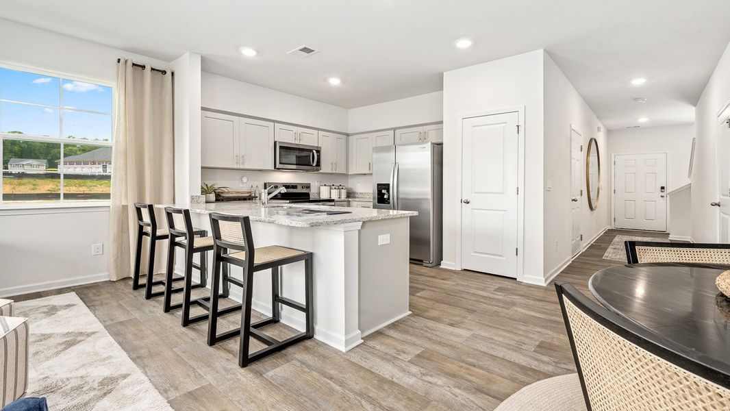 Furnished interior view inside a new home in North Village Townes, Greensboro (Image 3).